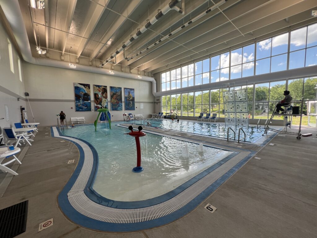 Image of Southeast Community Center's indoor pool and mural.