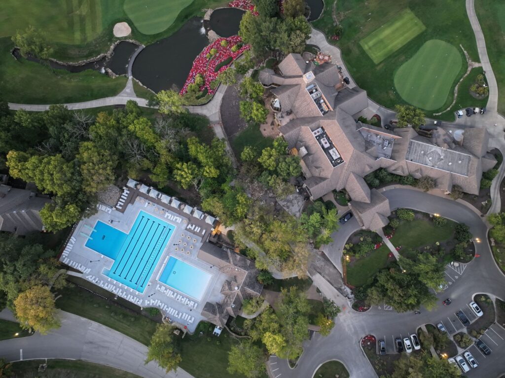 Aerial photo of the Loch Lloyd Country Club outdoor pool in Loch Lloyd, Missouri.