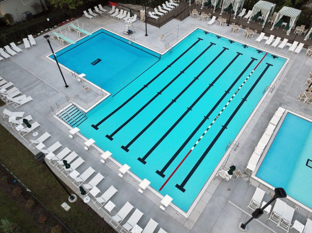 Aerial photo of the Loch Lloyd Country Club outdoor pool in Loch Lloyd, Missouri.