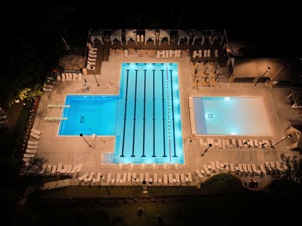 Aerial photo of the Loch Lloyd Country Club outdoor pool in Loch Lloyd, Missouri.
