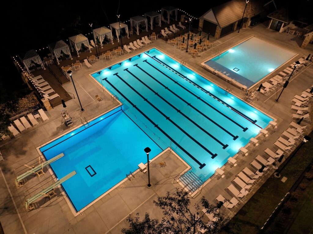 Aerial photo of the Loch Lloyd Country Club outdoor pool in Loch Lloyd, Missouri.