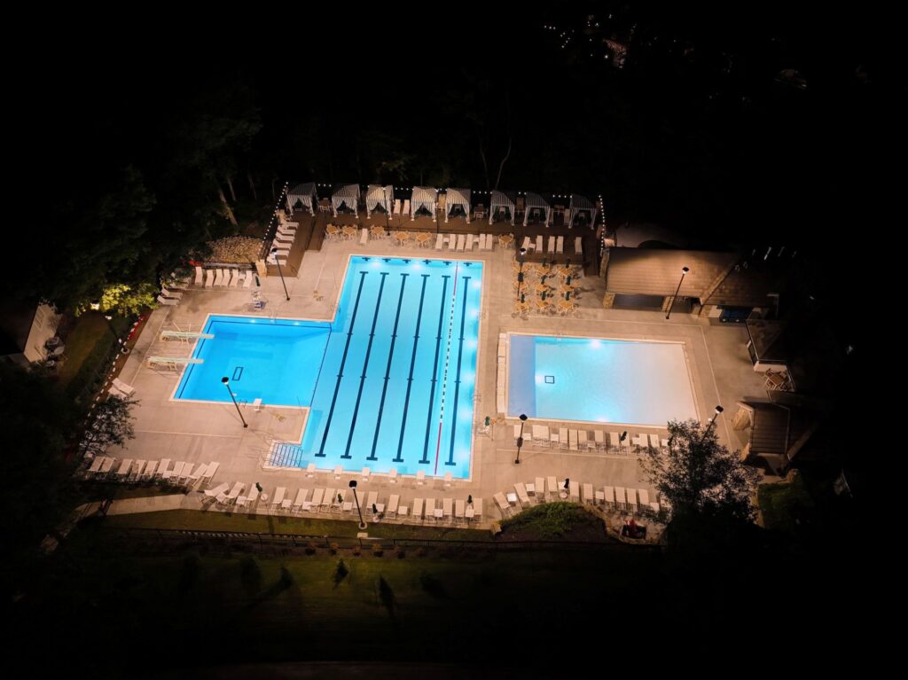 Aerial photo of the Loch Lloyd Country Club outdoor pool in Loch Lloyd, Missouri.
